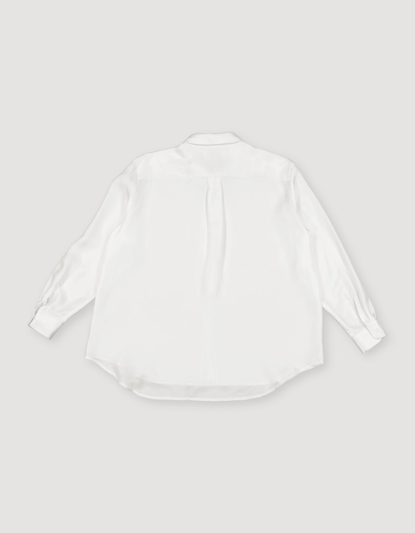 White shirt on a light gray background
