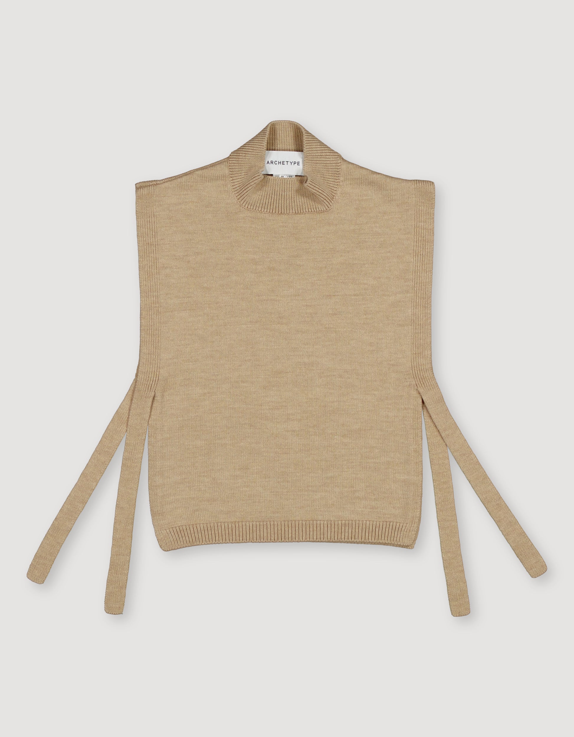 Beige sleeveless sweater with tie details on a white background