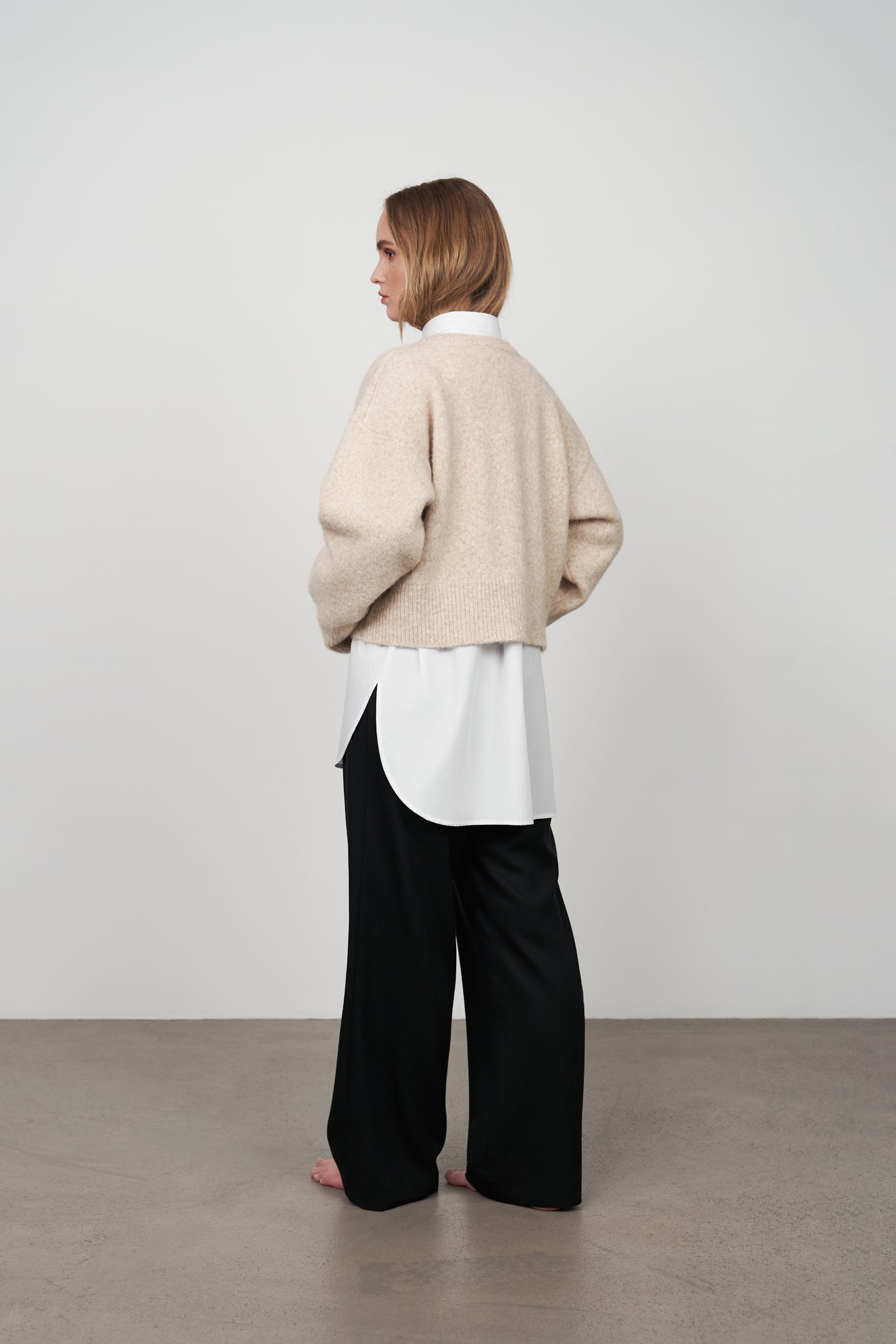 PLEATED BLACK STRAIGHT-LEG TROUSERS